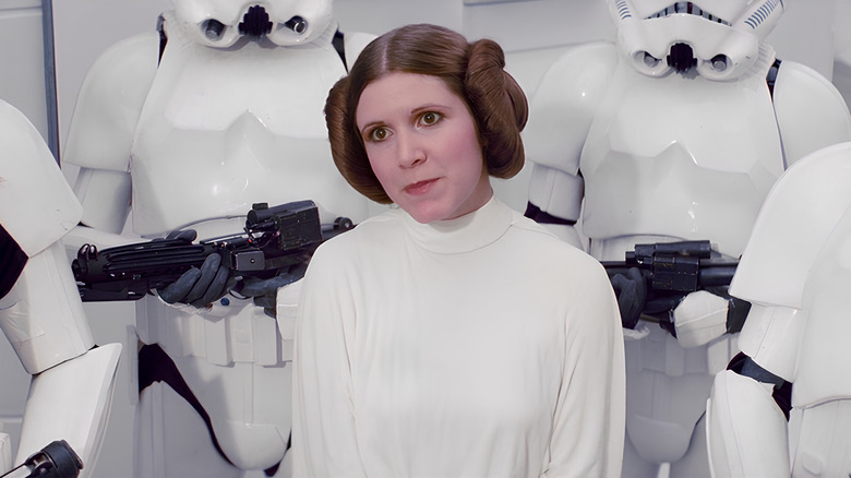 Princess Leia surrounded by Stormtroopers