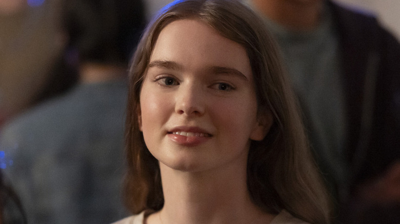 Carrie smiles in 