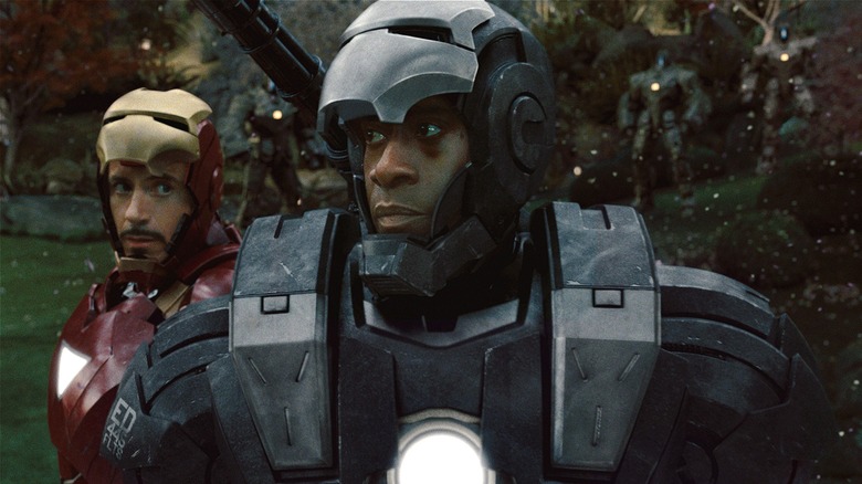 Rhodey in War Machine suit next to Iron Man