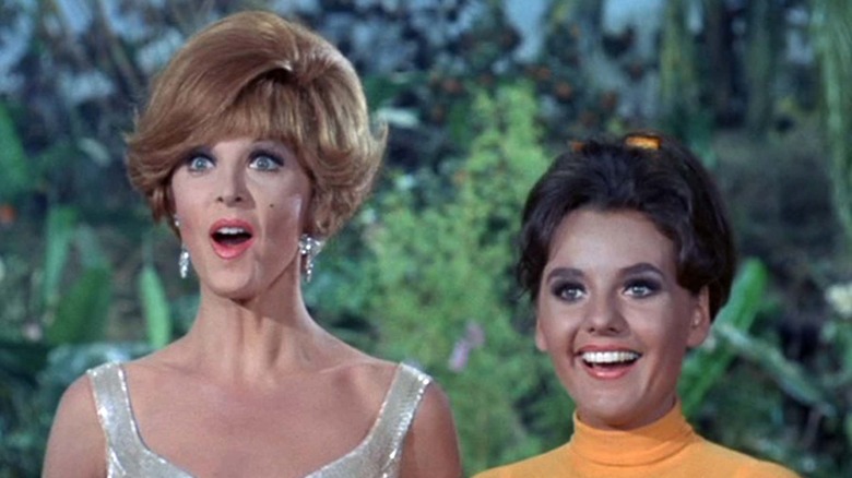 Ginger and Mary Ann smile and laugh on Gilligan's Island (1964)