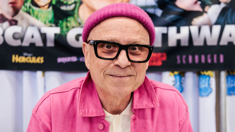 Bobcat Goldthwait wearing a pink beanie and shirt at Comic-Con