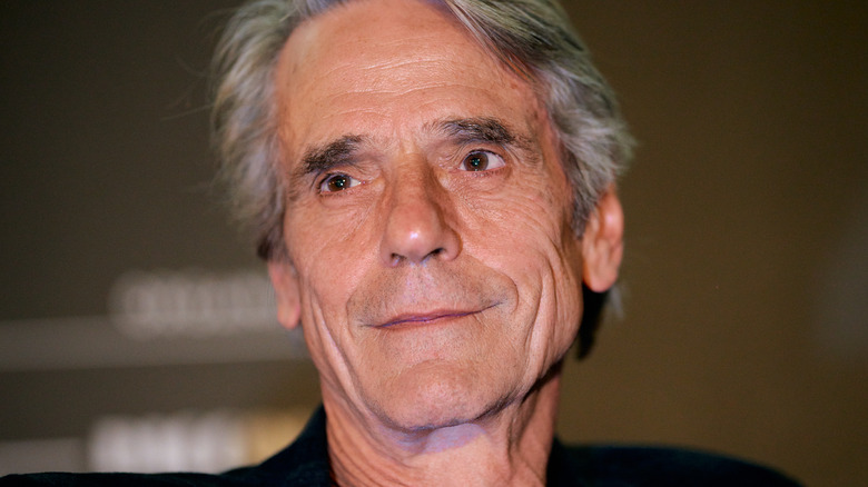 Jeremy Irons posing for photo