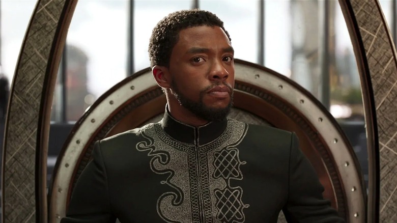 T'Challa sitting on throne listening in Black Panther