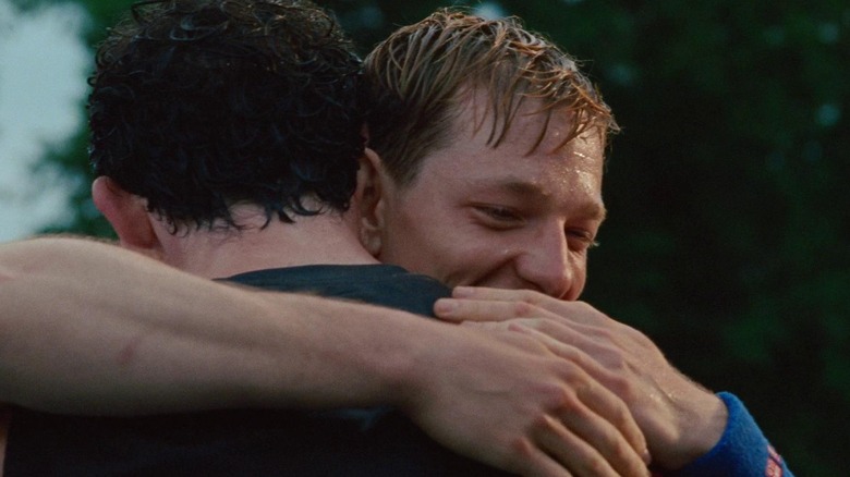 Art and Patrick embracing at the end of the match in "Challengers"