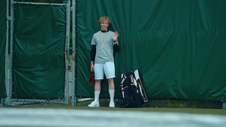 Mike Faist waving