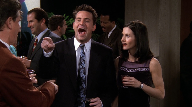 Chandler pointing and laughing