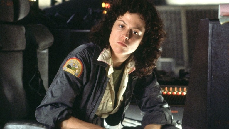 Ellen Ripley working at a console in "Alien" (1979)