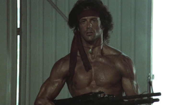 Rambo holds gun