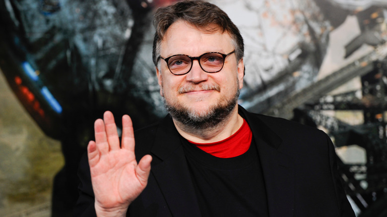 Guillermo Del Toro waving at the European Premiere of "Pacific Rim"