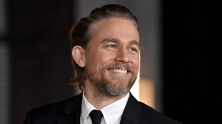 Hunnam smiles for a camera shot