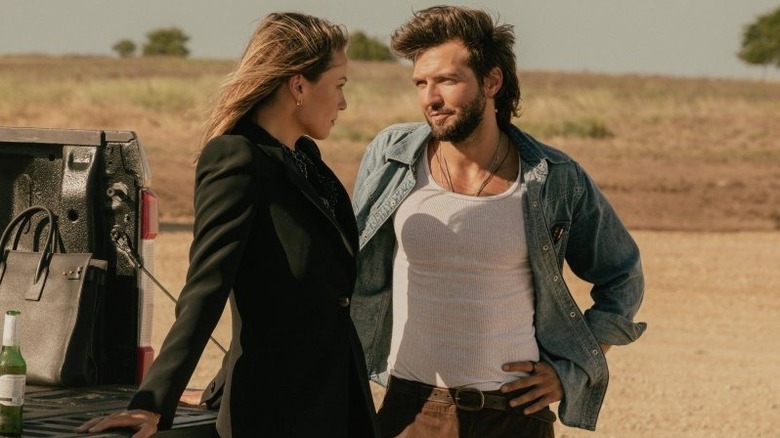 Rebecca and Charlie flirting with each other