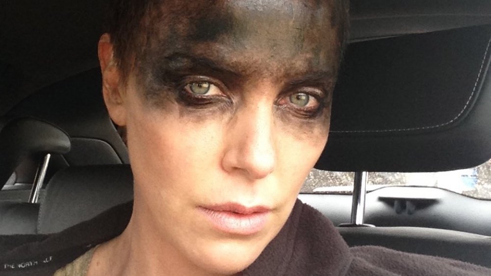 Charlize Theron posted this selfie from the set of Mad Max: Fury Road