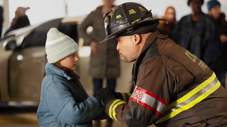 Cruz comforts a child in 