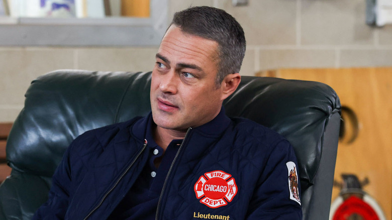 Kelly Severide sitting in chair