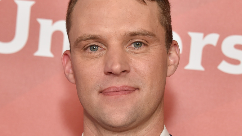 Jesse Spencer posing for press