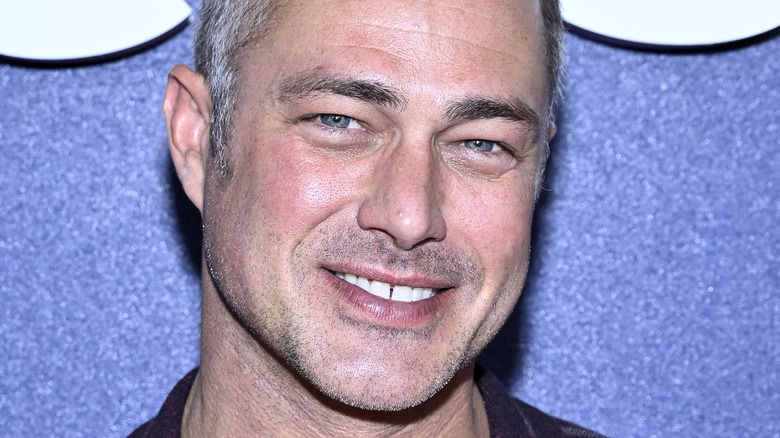 Taylor Kinney smiling