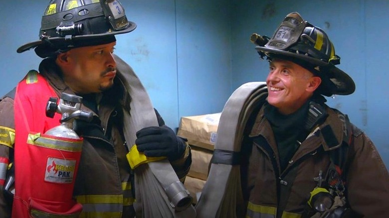 Joe Cruz and Christopher Herrmann in firefighter gear