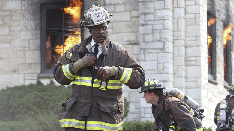 Eamonn Walker surveying a fire