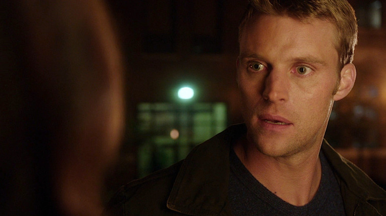 Casey desires Dawson in doorway