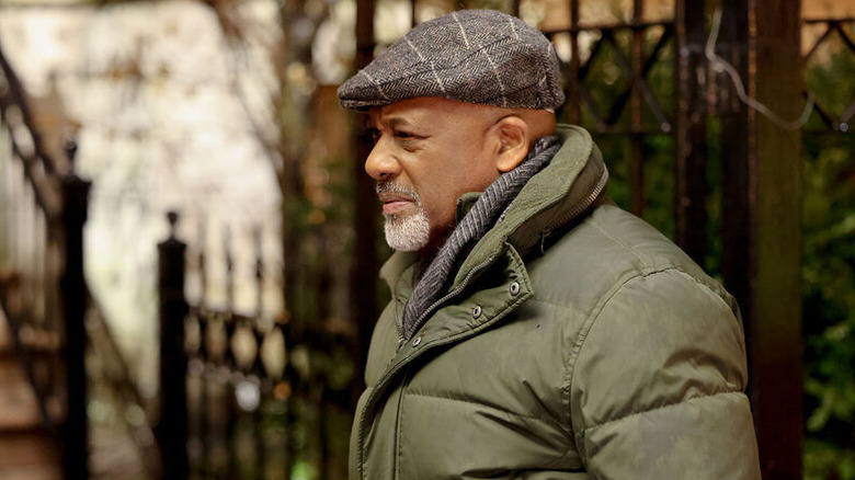 Bert Goodwin standing outside in winter clothes in "Chicago Med" (2015-present)