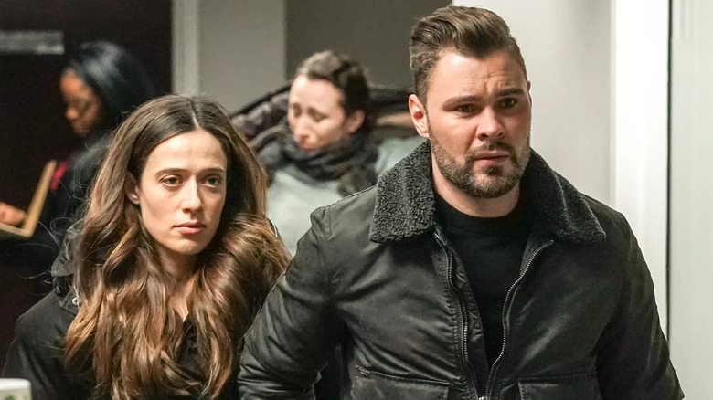 Ruzek and Burgess walking in 