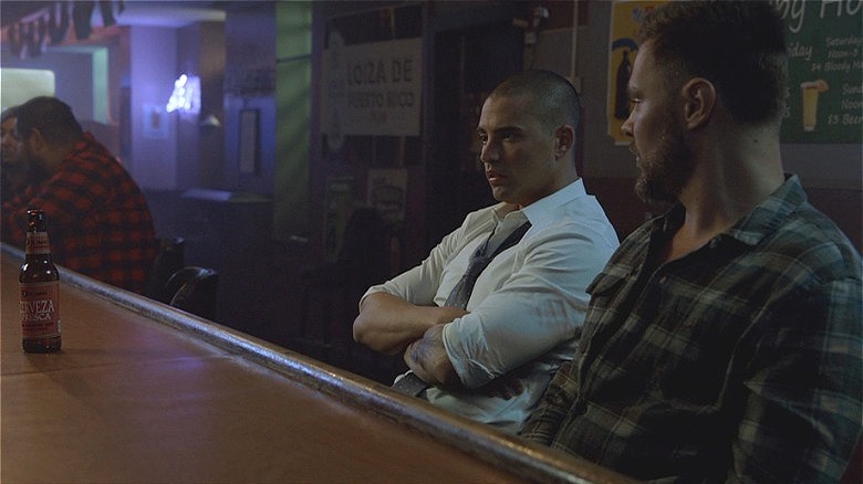 Torres and Ruzek share a drink at a bar 