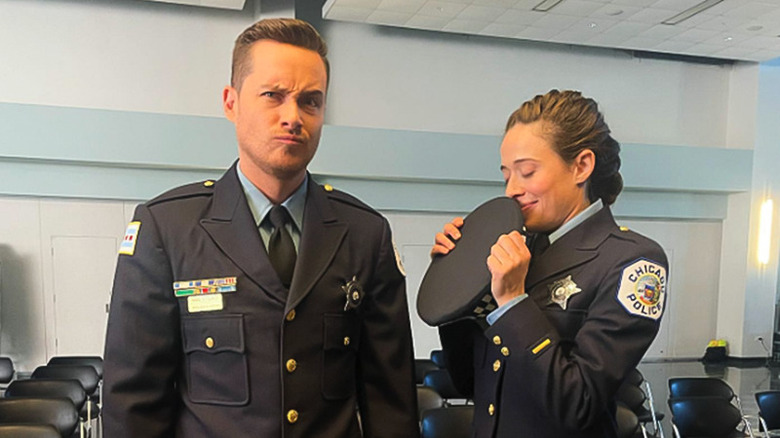 Burgess smelling Halstead's hat