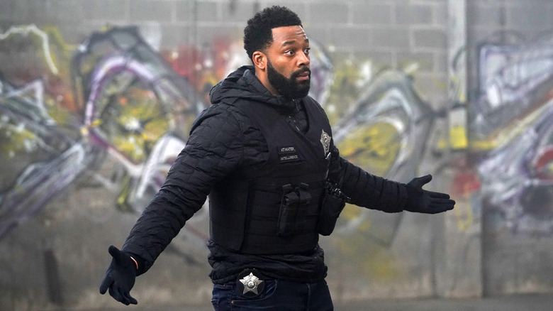 Officer Kevin Atwater extending his arms