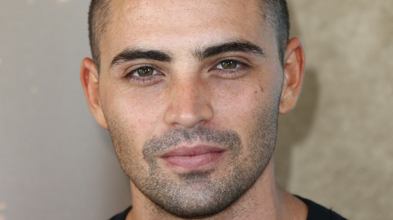 Benjamin Levy Aguilar looking into camera