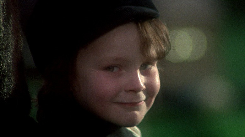 Damien smirking in The Omen (1976)