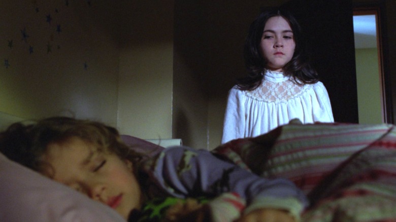 Esther watches Max sleep in Orphan (2009)