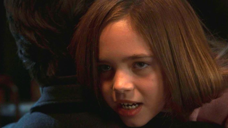 Alma baring her pointed teeth in American Horror Story: Red Tide