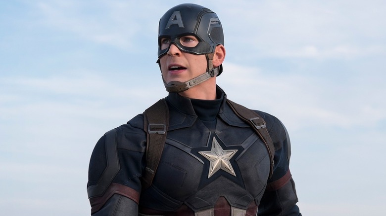 Cap mouth open helmet on staring