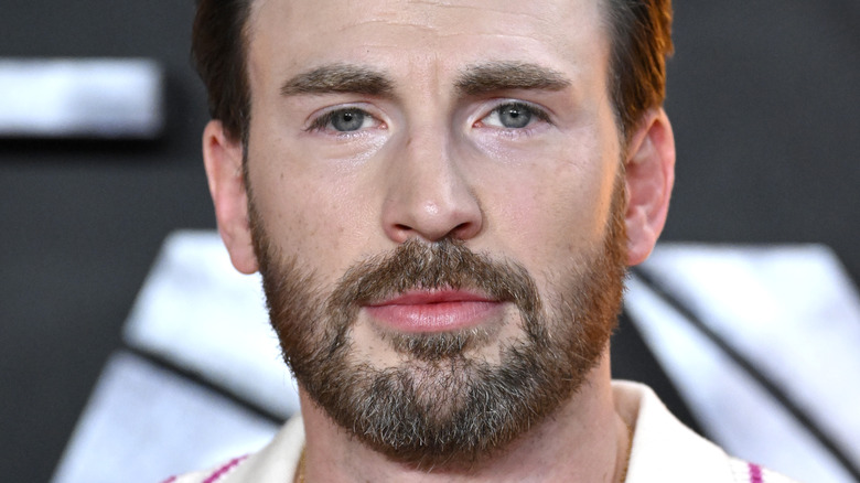 Actor Chris Evans posing for camera