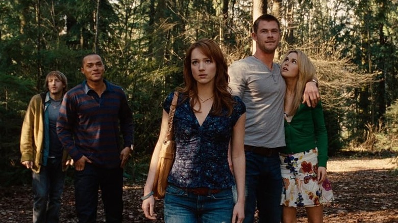 Curt, Marty, Dana, Jules, and Holden approach the cabin in Cabin in the Woods