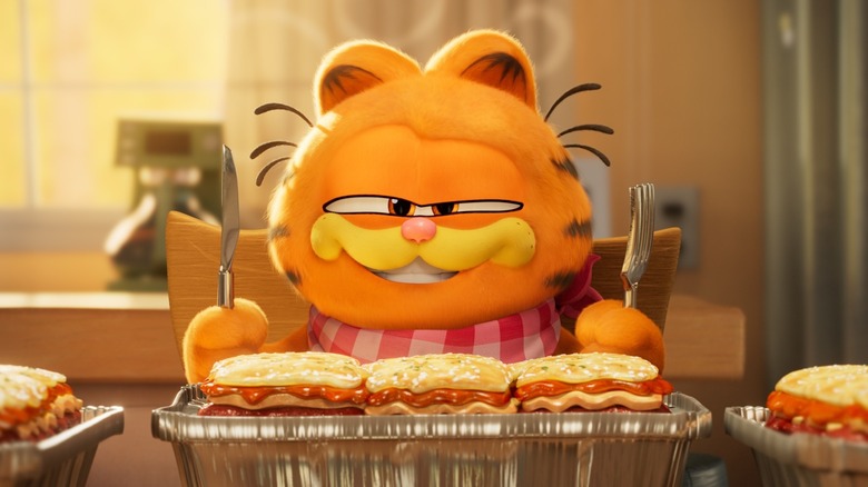 Garfield grinning by lasagna