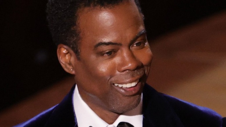 Chris Rock on stage at the 2022 Oscars