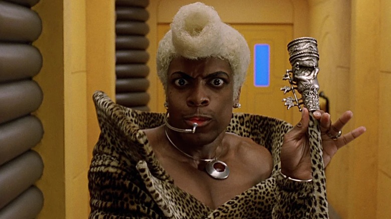 Ruby Rhod smirking