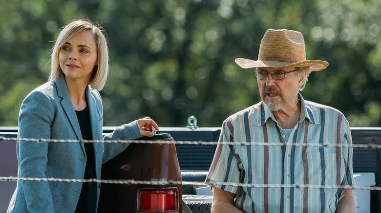 Christina Ricci and Christopher Walken looking away