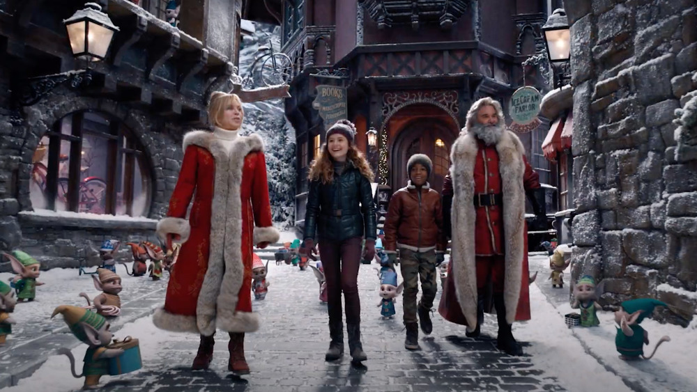 Goldie Hawn, Darby Camp, Jahzir Bruno, and Kurt Russell in The Christmas Chronicles 2