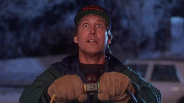 Calrk Griswold plugging his Christmas lights in in National Lampoon's Christmas Vacation (1983)
