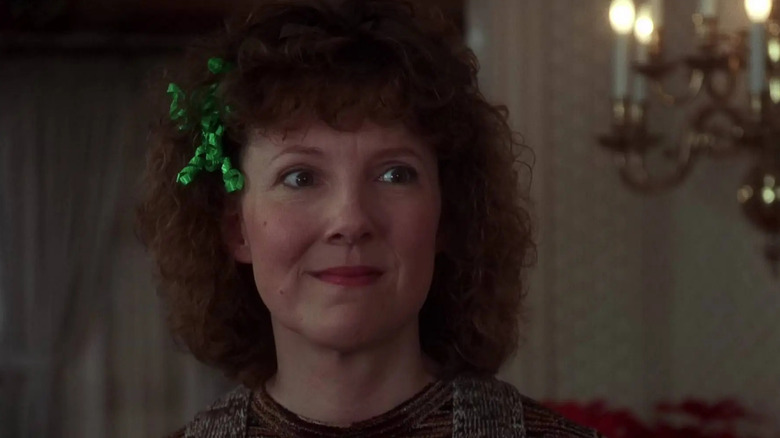 Catherine smiling with bow in her hair in National Lampoon's Christmas Vacation (1983)