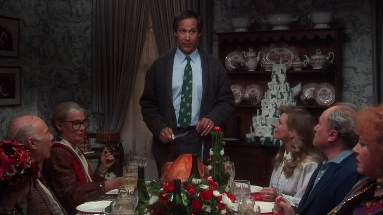 Griswold family sitting around the dinner table in National Lampoon's Christmas Vacation (1983)