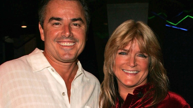 Susan Olsen and Christopher Knight smiling