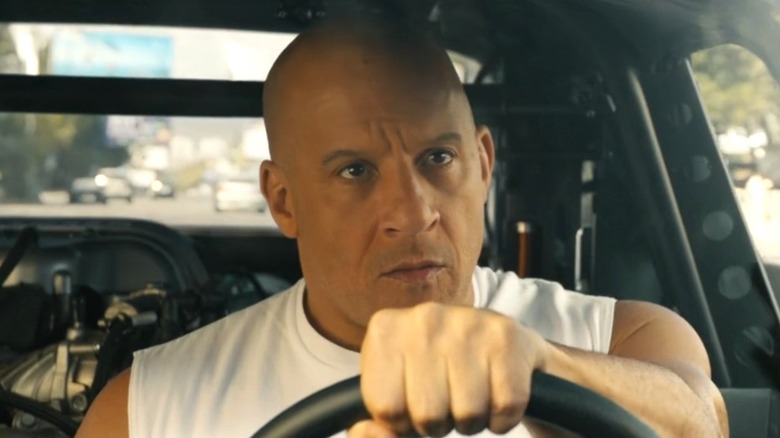 Dom Toretto gripping steering wheel