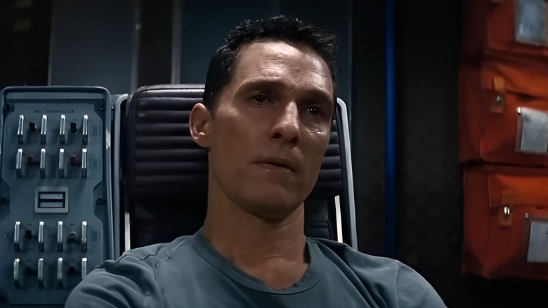 Coop sitting in a chair and crying in 