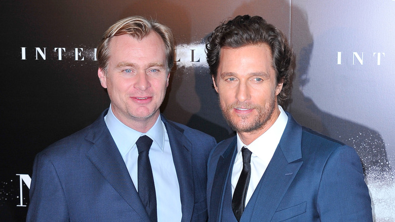Christopher Nolan and Matthew McConaughey pose for pictures iat the 