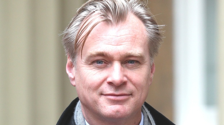 Christopher Nolan grinning