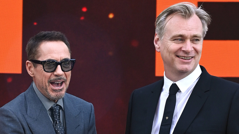 Robert Downey Jr. and Christopher Nolan smiling
