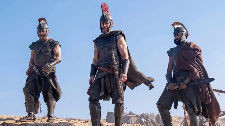 Odysseus and his men looking down from a hilltop in The Odyssey